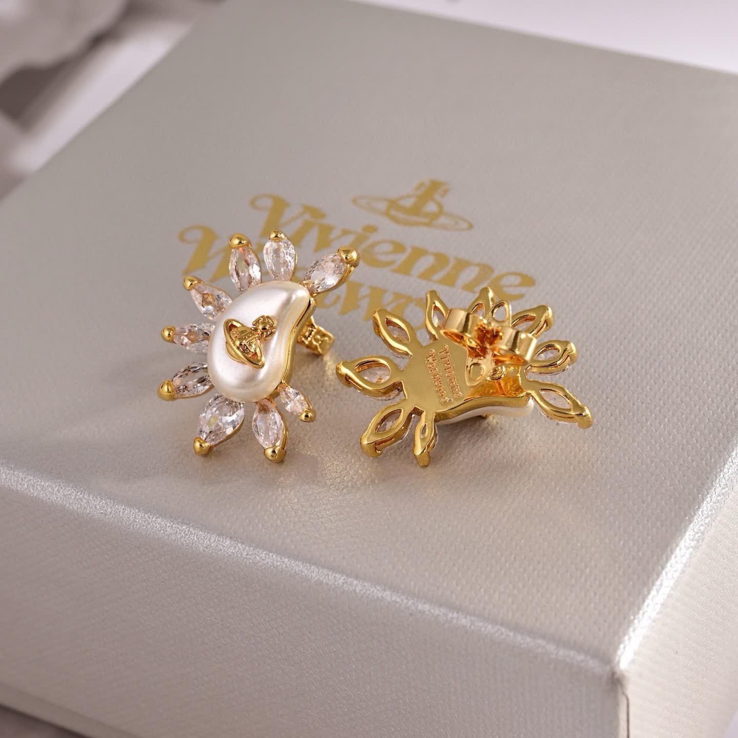 Vivienne Westwood Elegant Pearl and Diamond Stud Earrings